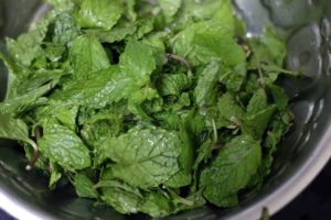fresh mint leaves in a bowl